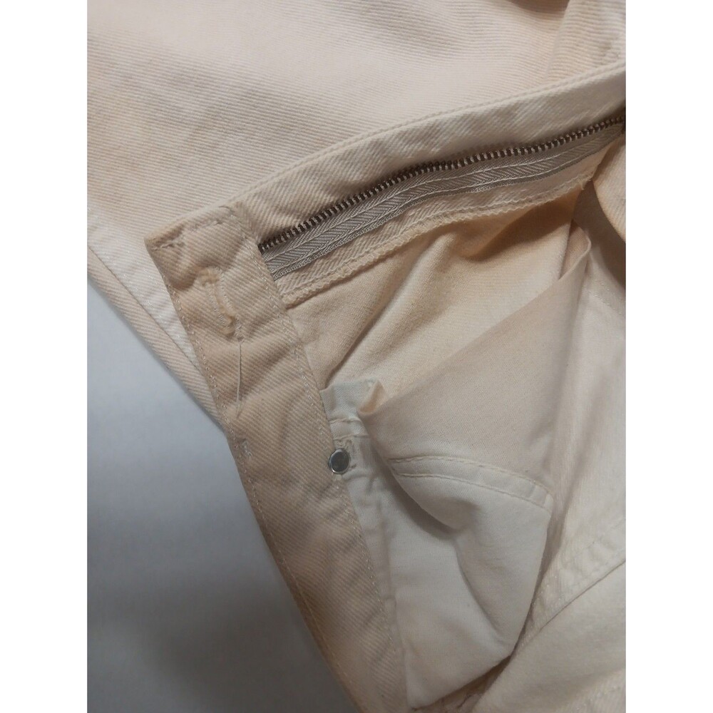 white rustler legendary gold jeans